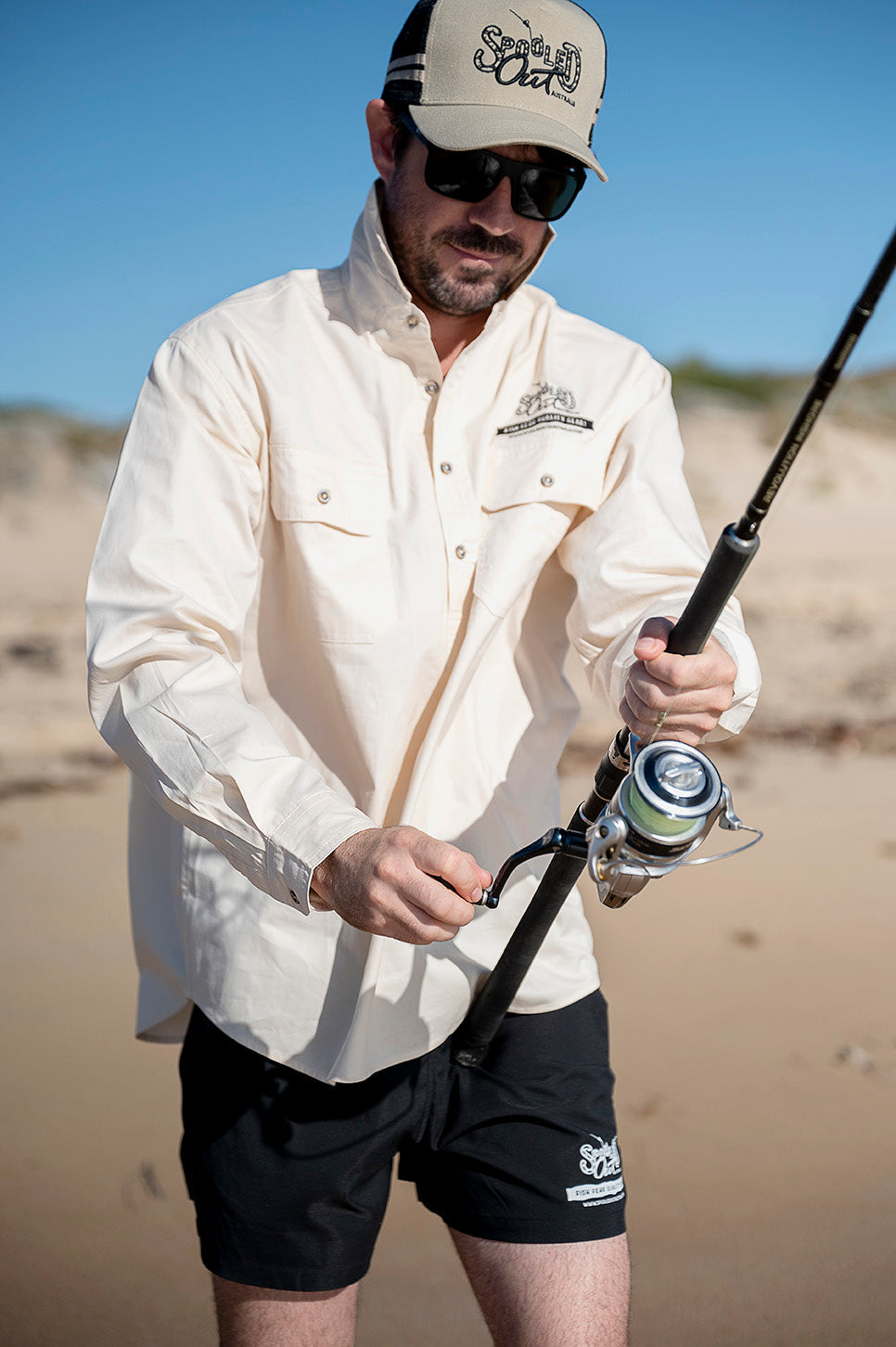 Saltwater fishing reel and tackle being cleaned after use
