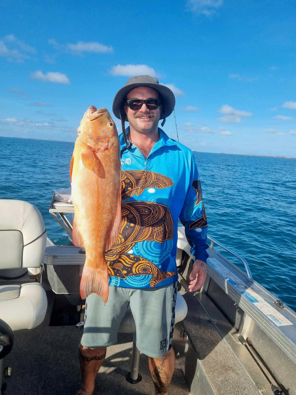 Angler practising responsible catch and release in Australian waters