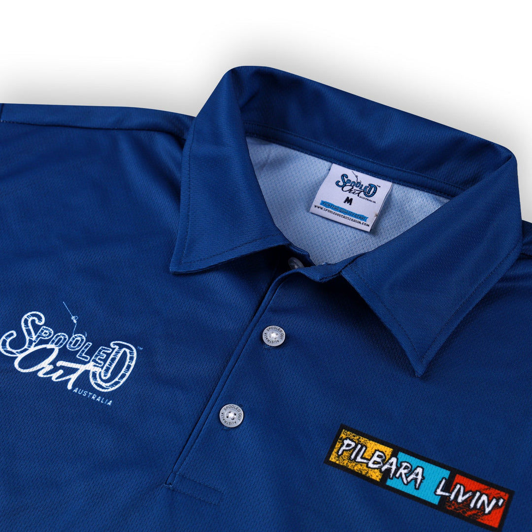 Close up of blue Spooled Out Australia shirt with Pilbara Living logo