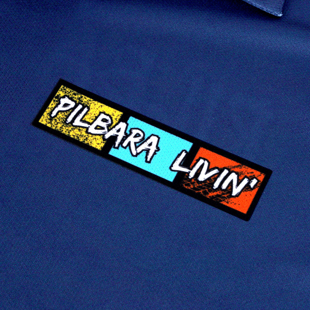 Close up of blue fishing shirt with Pilbara Livin logo