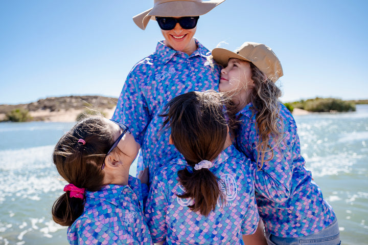 Mermaid Scales Fishing Shirt - Mum and three kids in group hug laughing, emotional hero