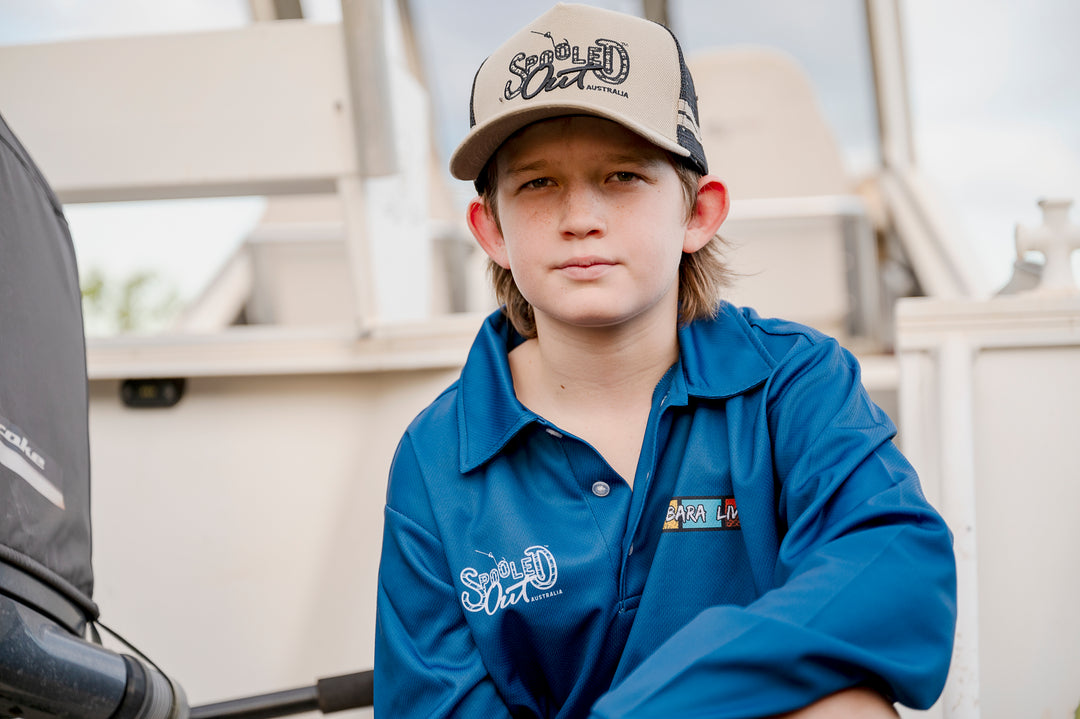 Pilbara Livin' Fishing Shirt - Teen boy front portrait on boat